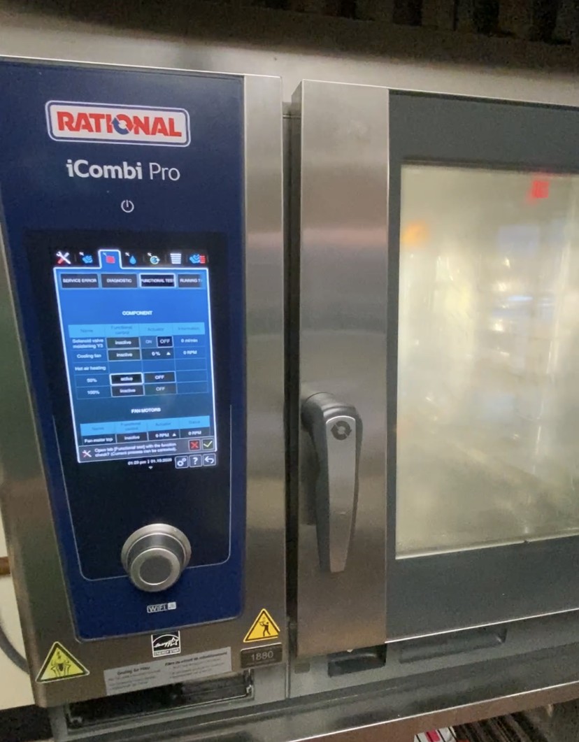 Commercial combi oven being repaired in Philadelphia kitchen