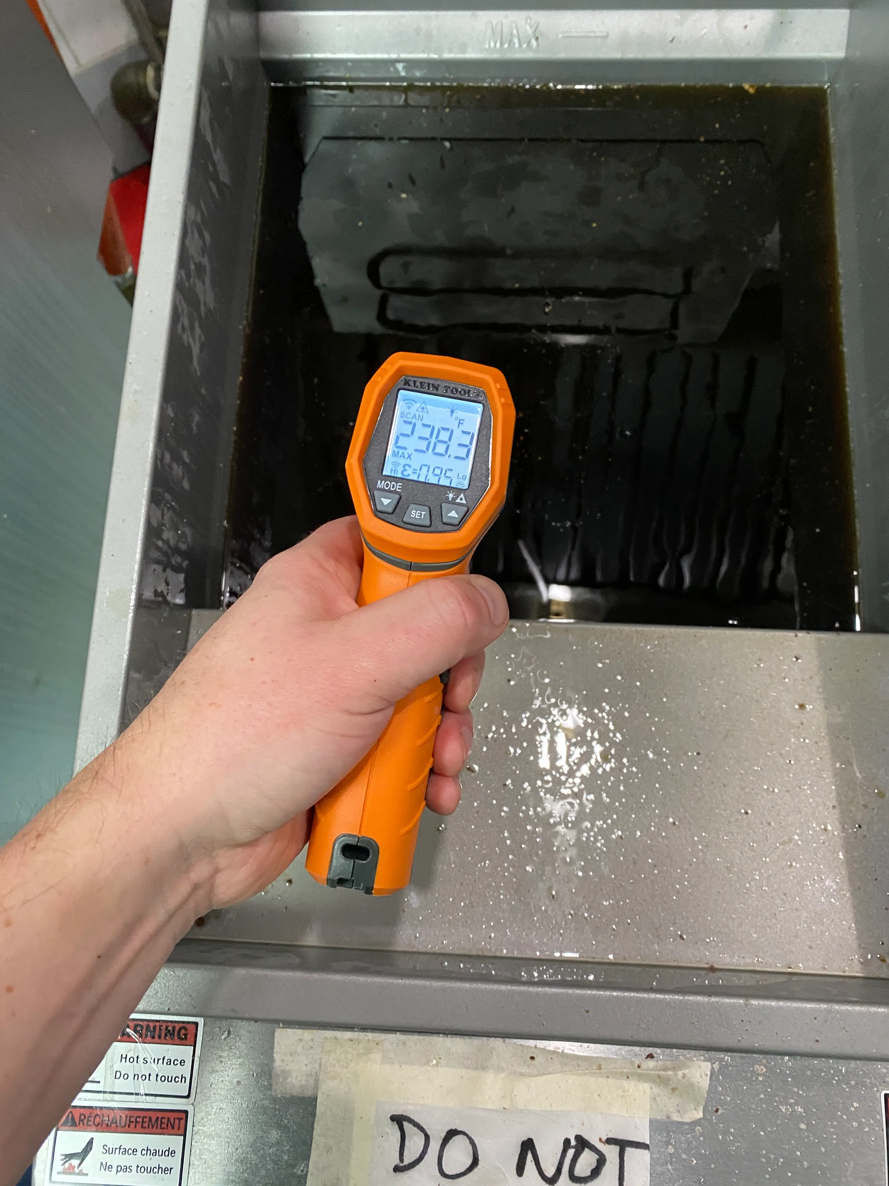 Commercial kitchen equipment opened for diagnostics